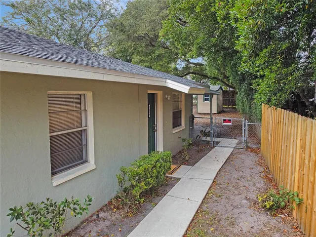 a house with a bench in front of it