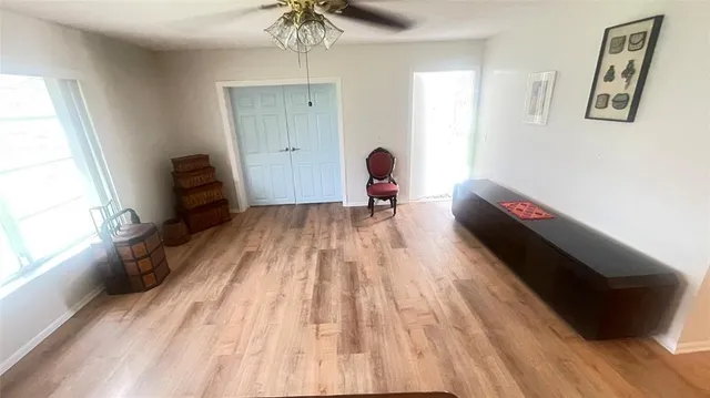 a bed room with a bed and a chandelier