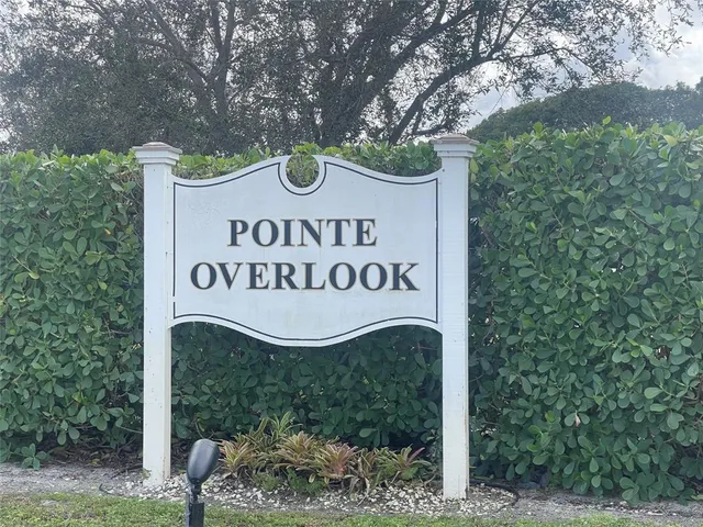 a sign broad on wooden wall