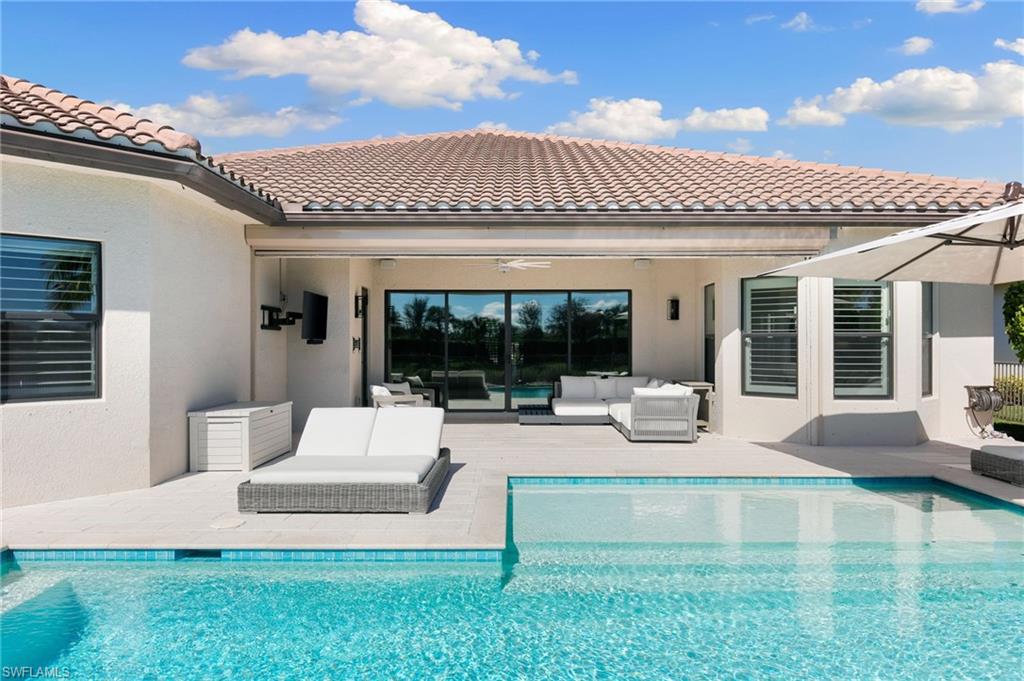4308 Caldera Circle Naples, FL 34119 - Photo 37 of 44 a view of pool with patio