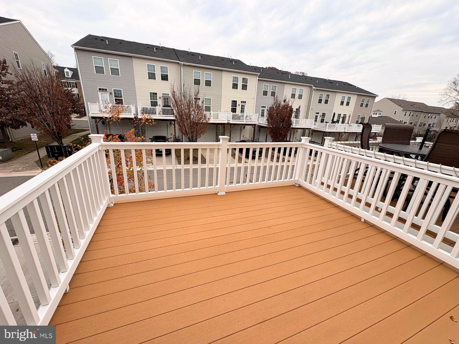 1718 Featherstone Road Woodbridge, VA 22191 - Photo 2 of 23 a view of a house with backyard and deck