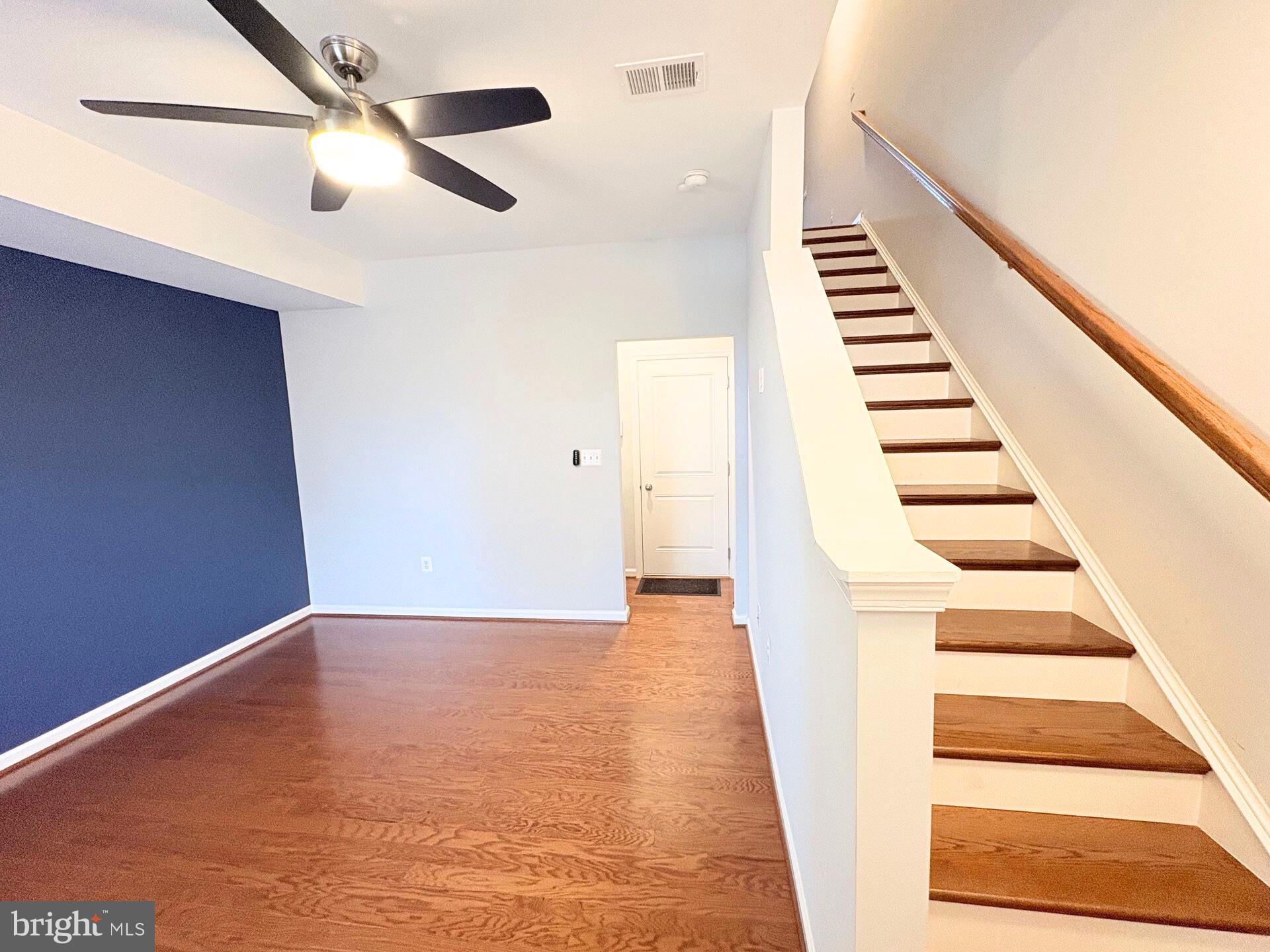 1718 Featherstone Road Woodbridge, VA 22191 - Photo 4 of 23 a view of a staircase with white walls