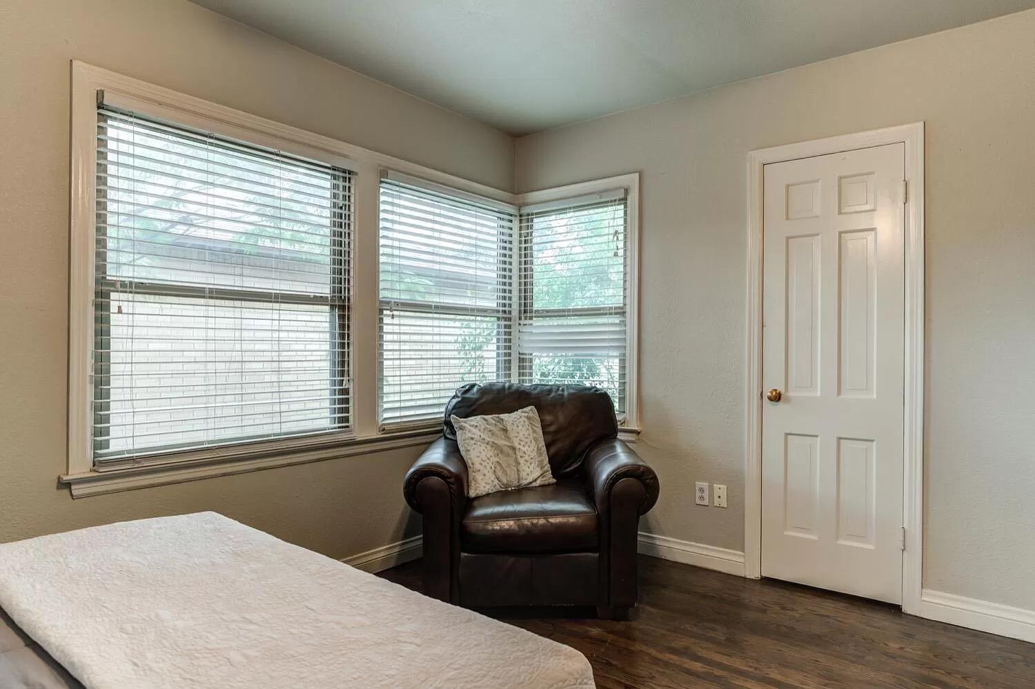 3204 28th Street Lubbock, TX 79410 - Photo 15 of 24 a living room with furniture and a window