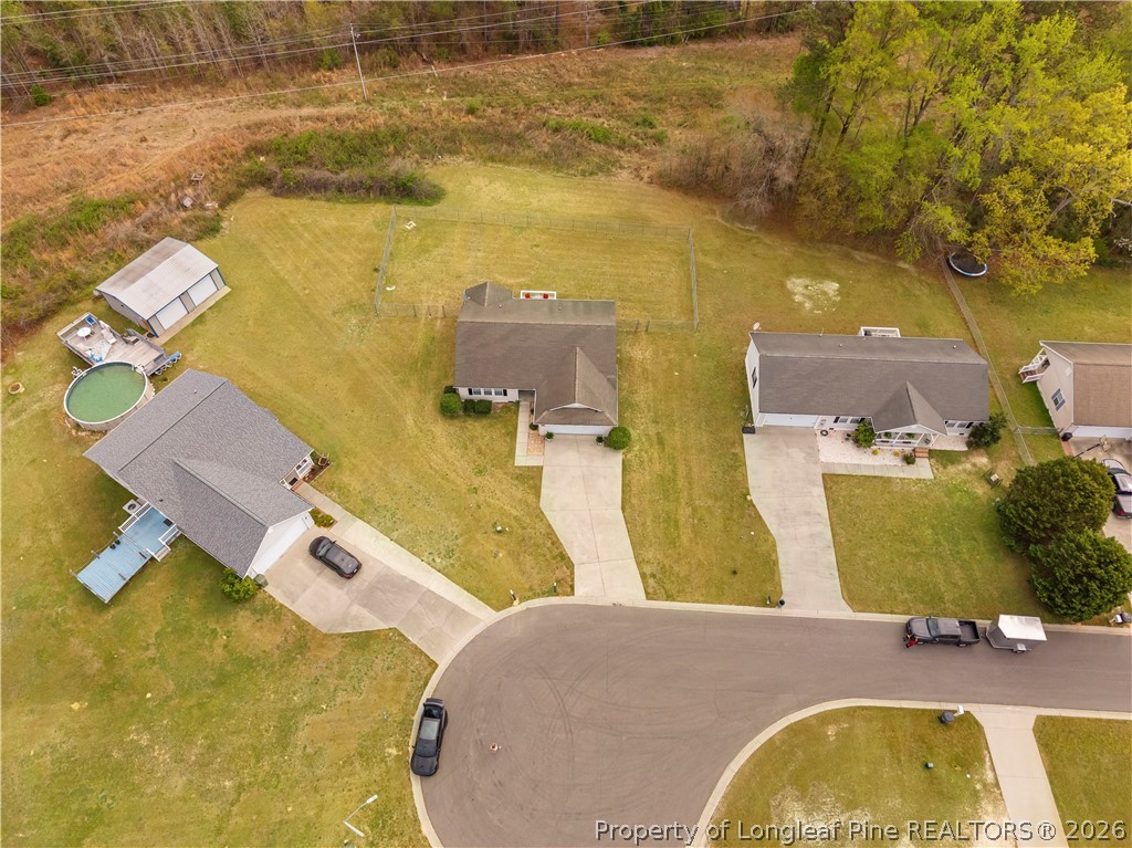 253 Farmstead Court Rockingham, NC 28379 - Photo 24 of 25 an aerial view of residential house with pool and yard