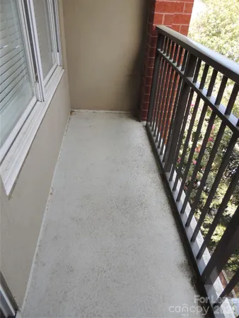 a view of a couches in backyard of house