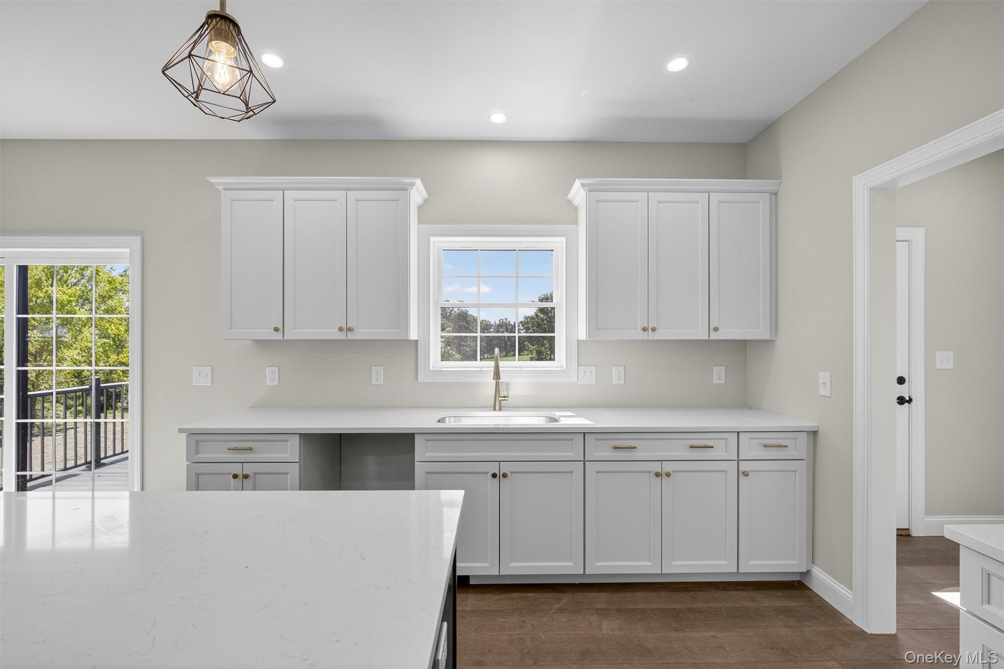 65 Kings Hill Road Walden, NY 12586 - Photo 11 of 41 a kitchen with white cabinets and sink