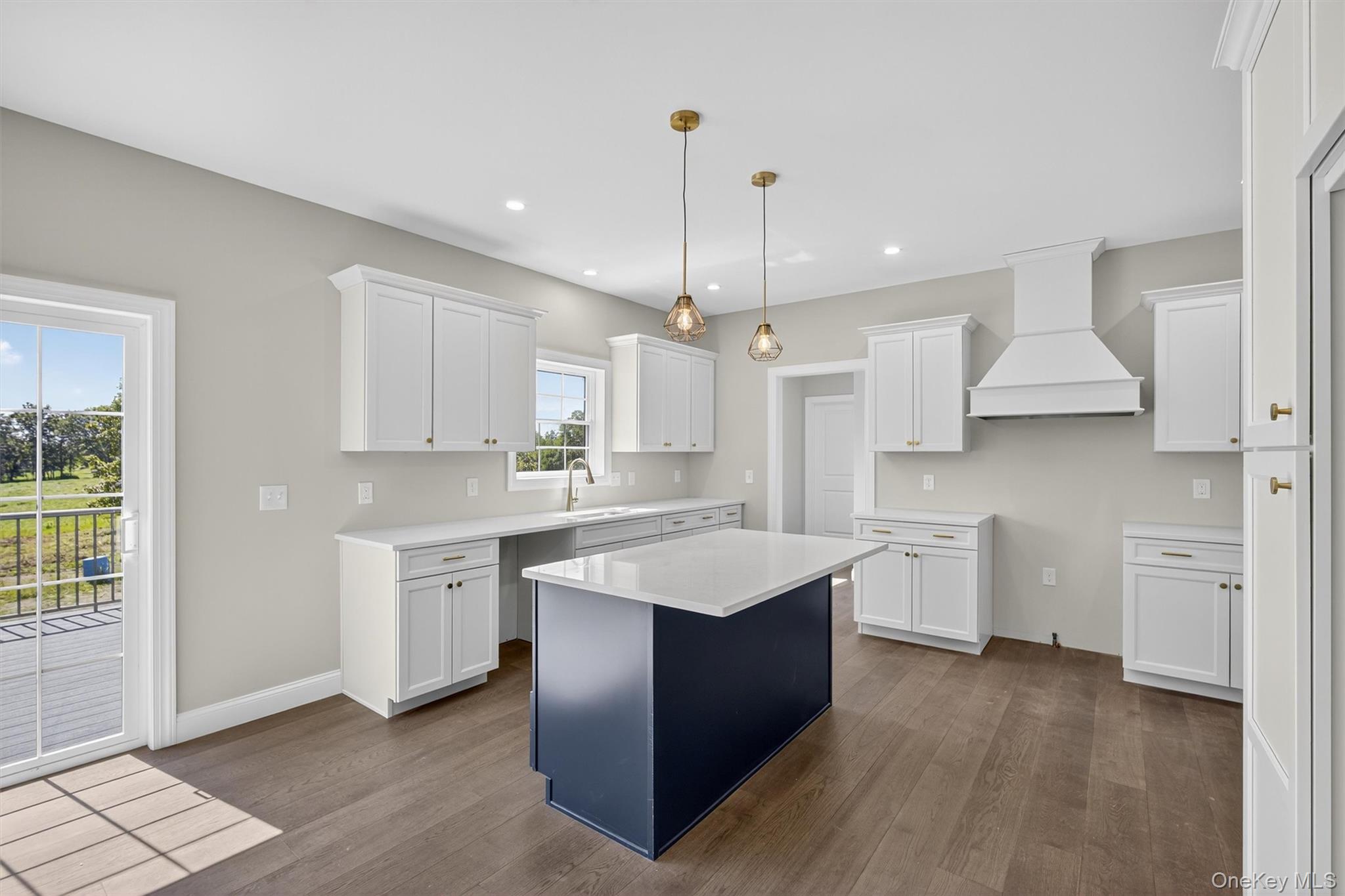 65 Kings Hill Road Walden, NY 12586 - Photo 12 of 41 a kitchen with white cabinets and sink