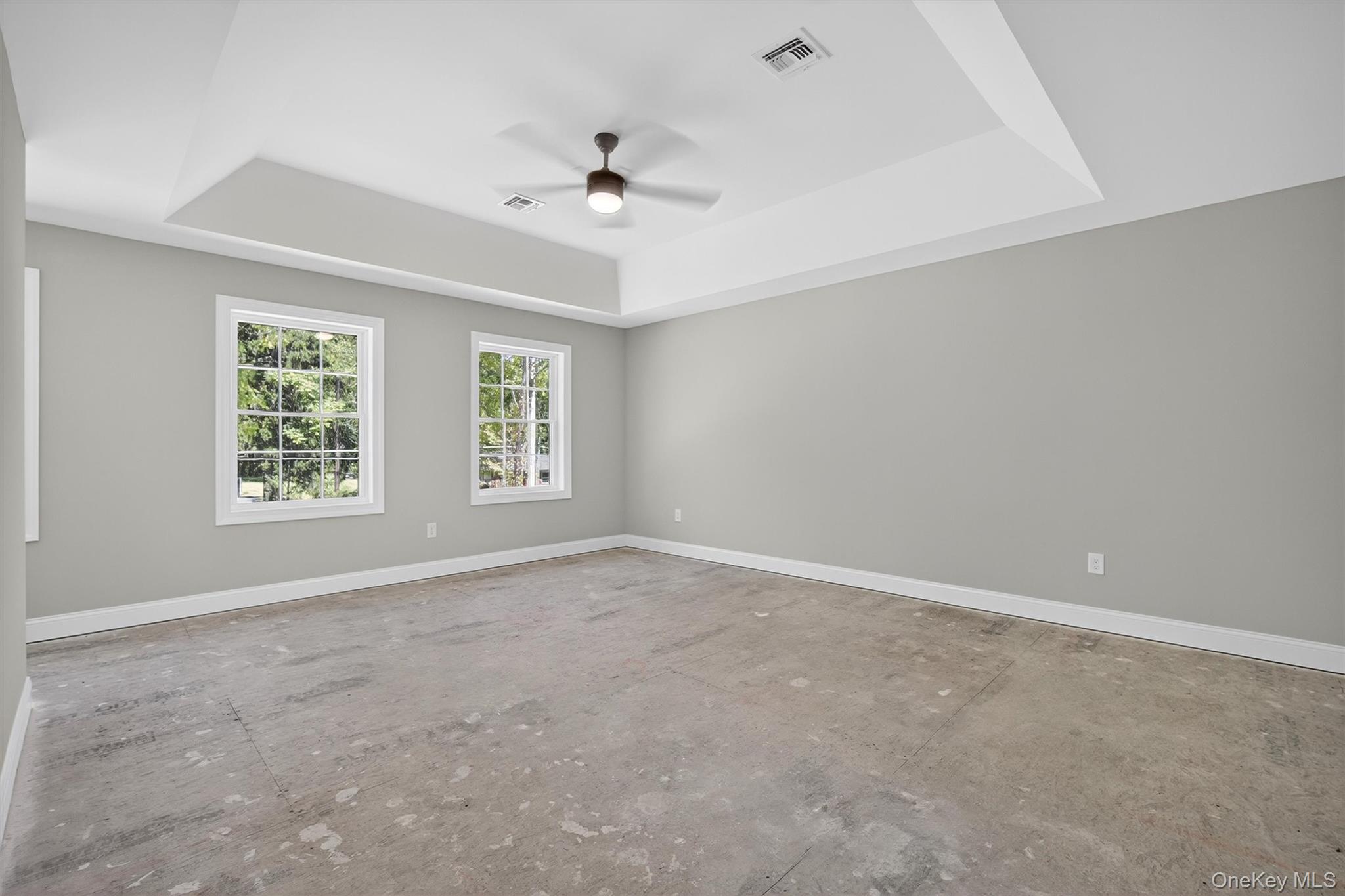 65 Kings Hill Road Walden, NY 12586 - Photo 25 of 41 an empty room with windows and ceiling fan