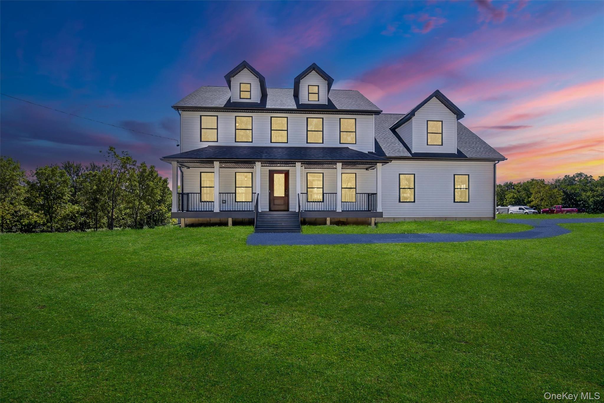 65 Kings Hill Road Walden, NY 12586 - Photo 3 of 41 a front view of a house with big yard and large trees