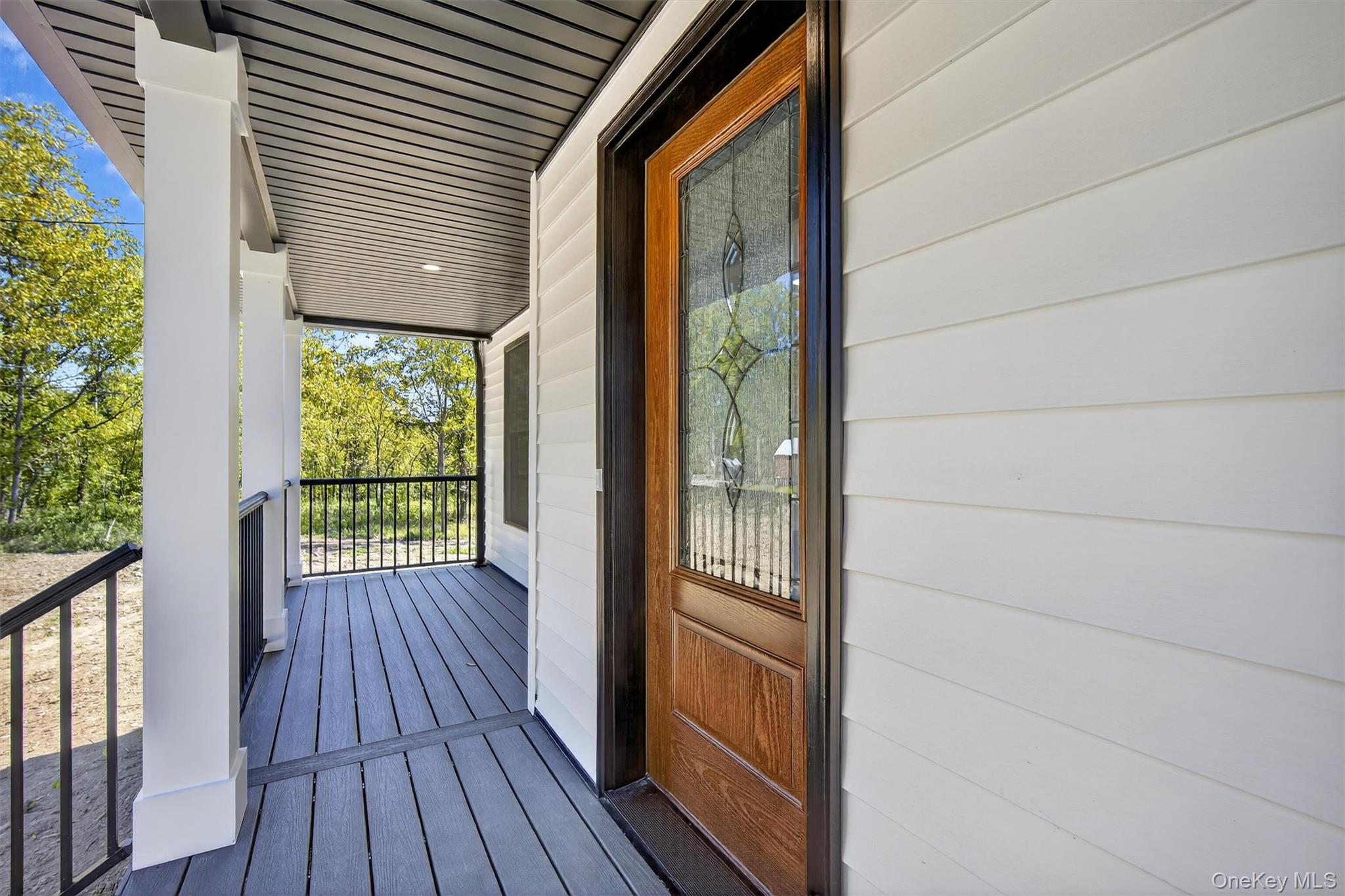 65 Kings Hill Road Walden, NY 12586 - Photo 4 of 41 a view of balcony with wooden floor