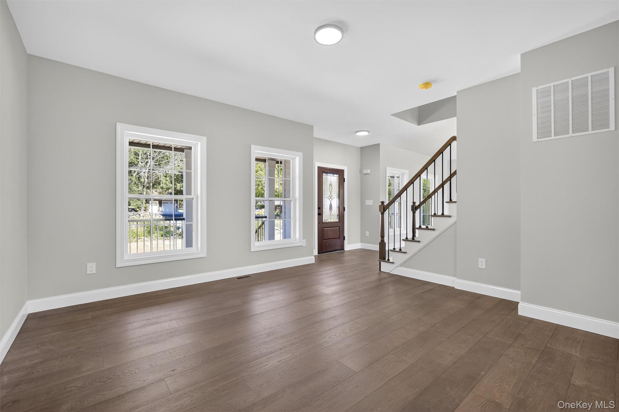 65 Kings Hill Road Walden, NY 12586 - Photo 6 of 41 a view of an empty room with wooden floor and a window