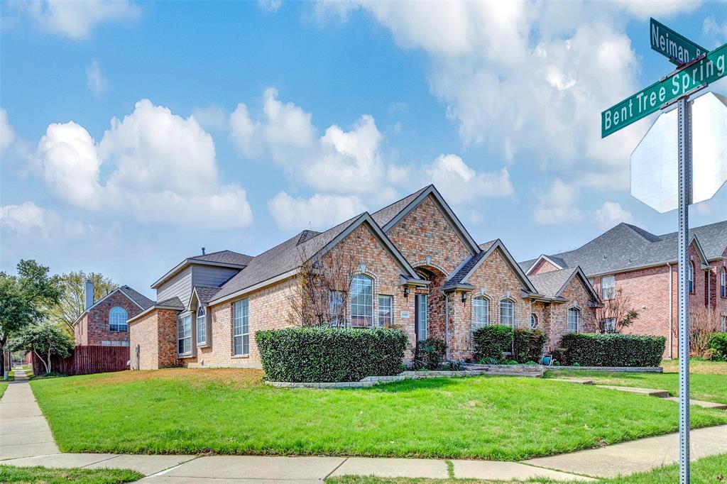 3500 Neiman Road Plano, TX 75025 - Photo 2 of 29 a front view of a house with a yard and garage