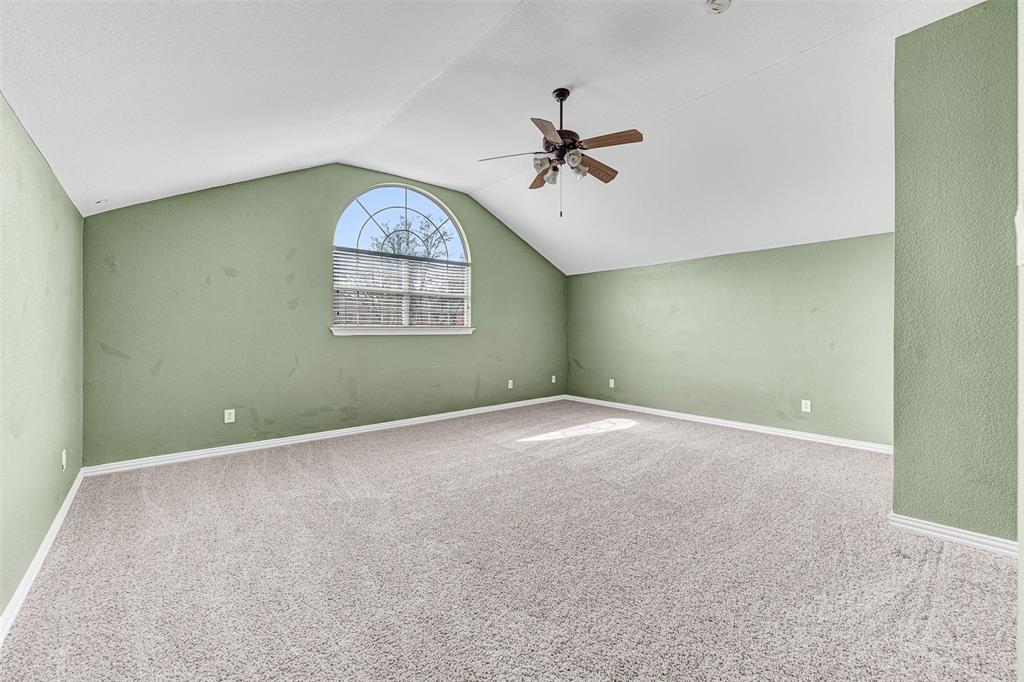 3500 Neiman Road Plano, TX 75025 - Photo 21 of 29 an empty room with a window and a fan