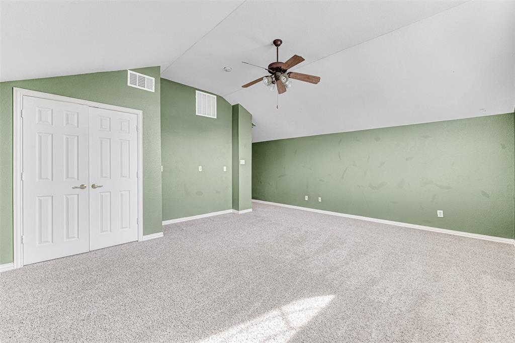 3500 Neiman Road Plano, TX 75025 - Photo 23 of 29 a view of a big room with a ceiling fan and entryway
