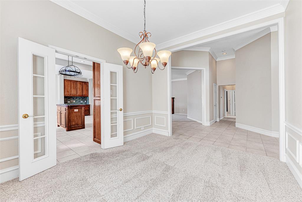 3500 Neiman Road Plano, TX 75025 - Photo 3 of 29 a view of a livingroom with a chandelier