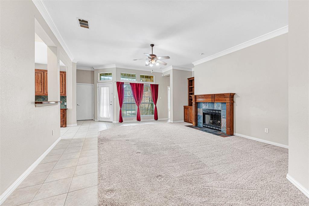 3500 Neiman Road Plano, TX 75025 - Photo 7 of 29 a view of an empty room with a fireplace