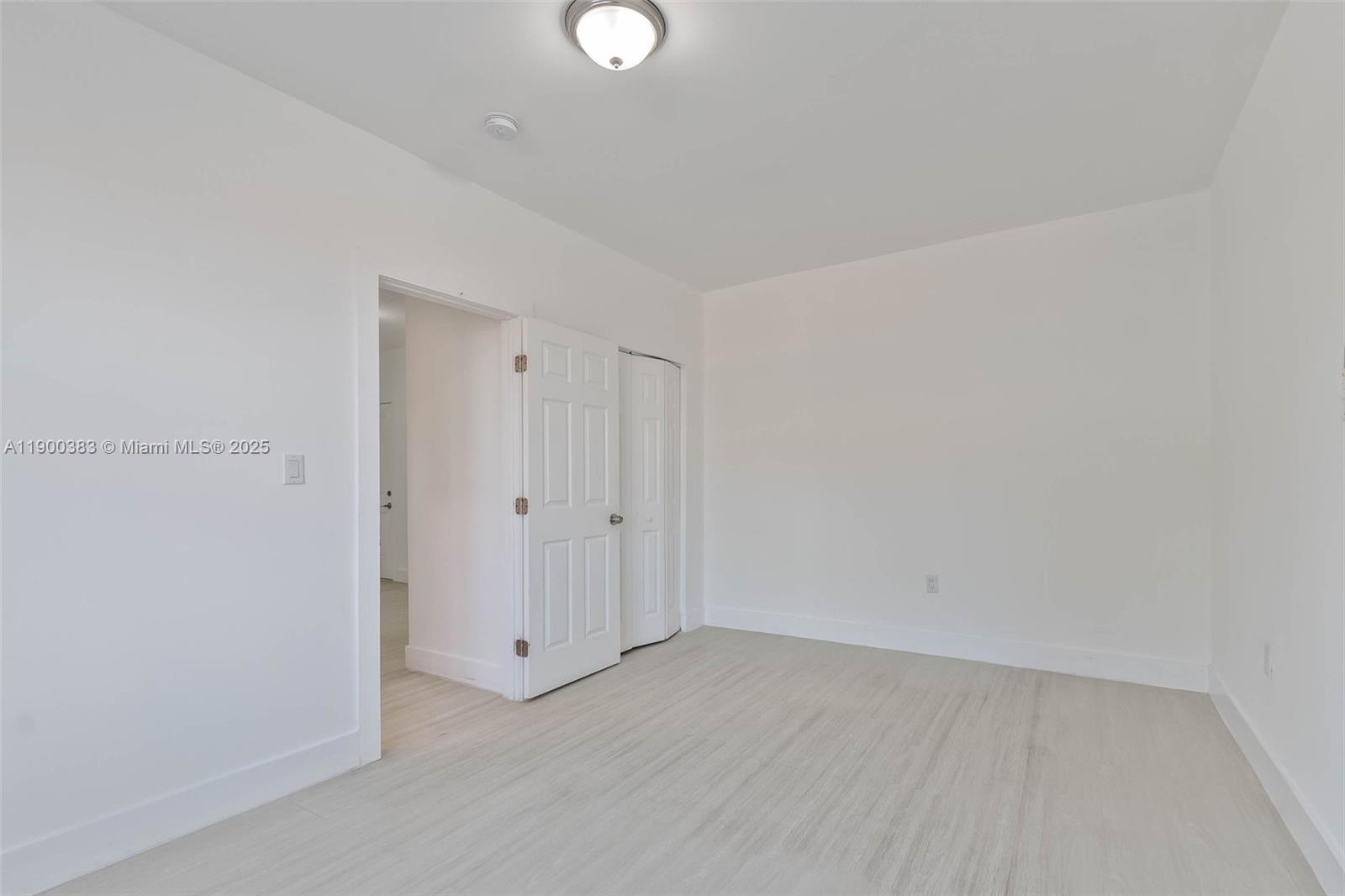 1051 Northwest 2nd Street, Unit 12 Miami, FL 33128 - Photo 11 of 14 a view of an empty room