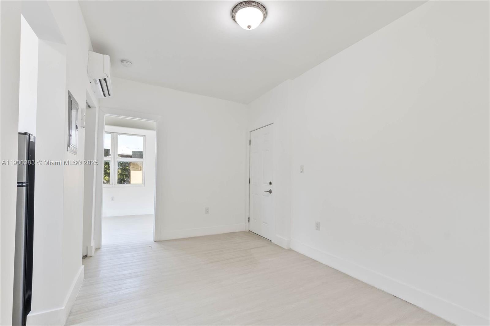 1051 Northwest 2nd Street, Unit 12 Miami, FL 33128 - Photo 7 of 14 a view of an empty room