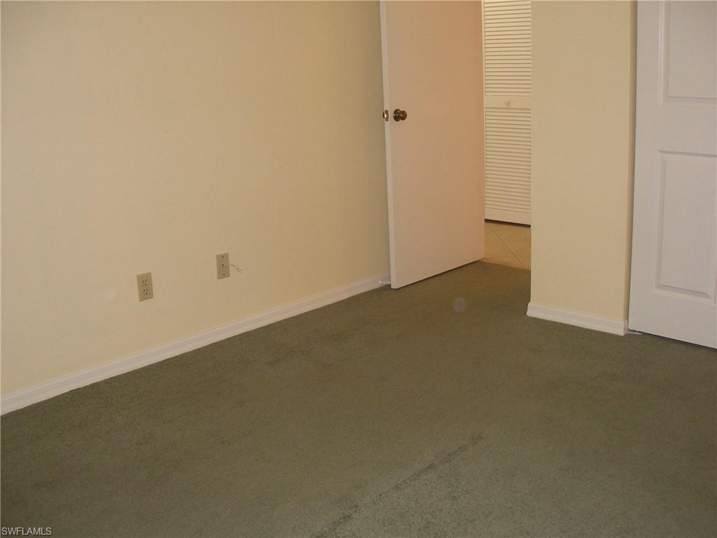 3342 Timberwood Circle Naples, FL 34105 - Photo 13 of 17 an empty room with a empty space
