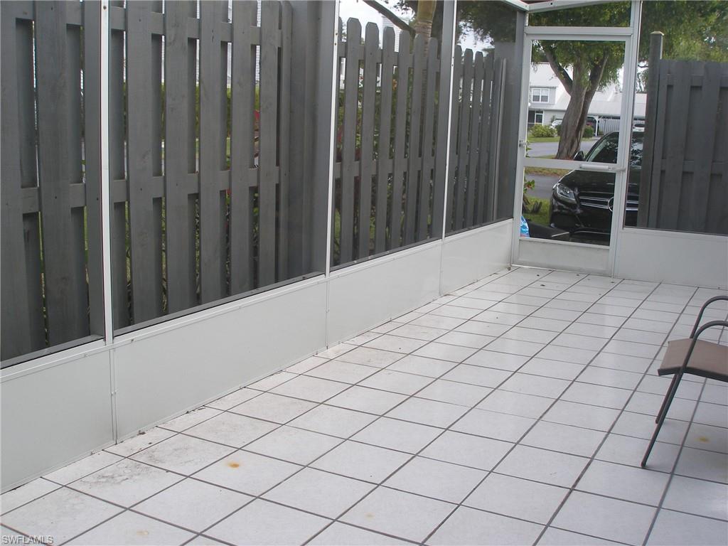 3342 Timberwood Circle Naples, FL 34105 - Photo 8 of 17 a view of a backyard