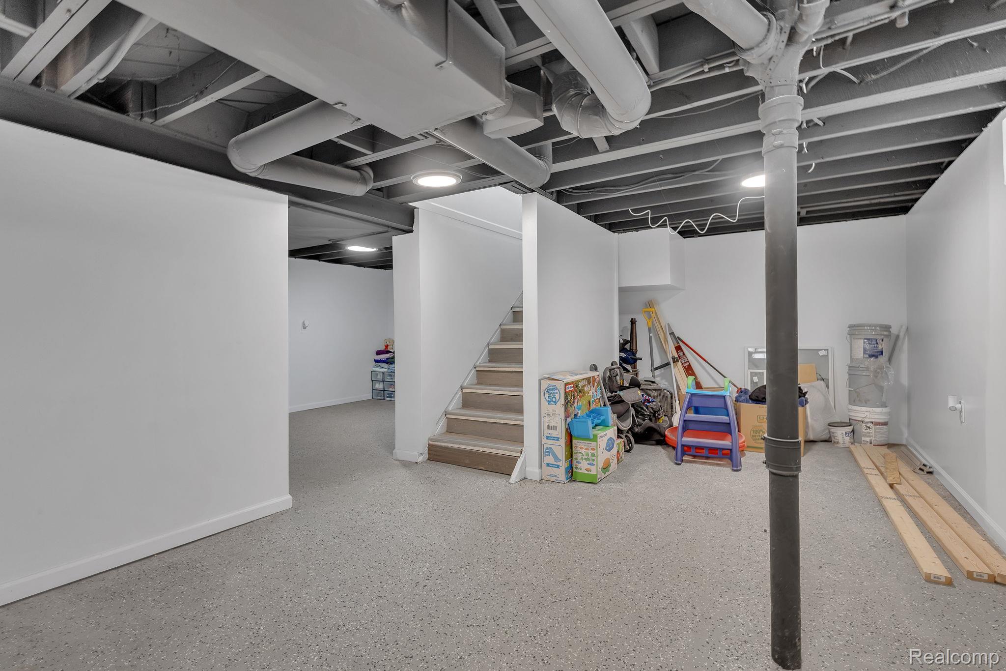 8401 Fielding Street Detroit, MI 48228 - Photo 20 of 34 Finished below grade area with stairs and baseboards