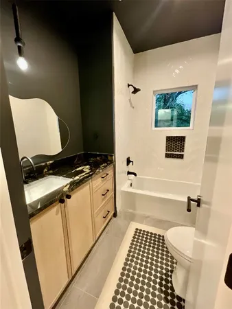 a view of an empty room with a closet