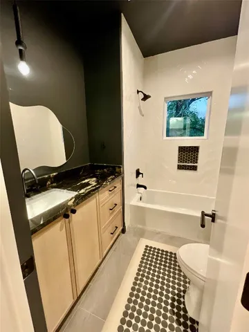 a view of an empty room with a closet