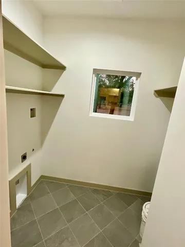 a bathroom with a bathtub sink and toilet
