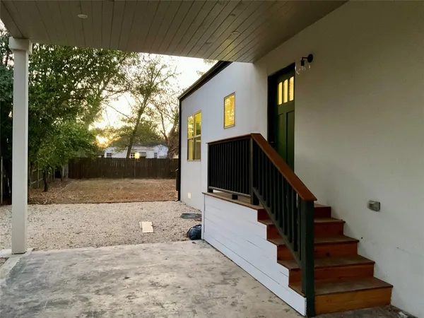 a view of a house with a snow in a yard