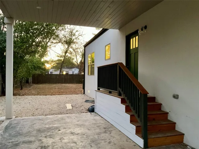 a view of a house with a snow in a yard