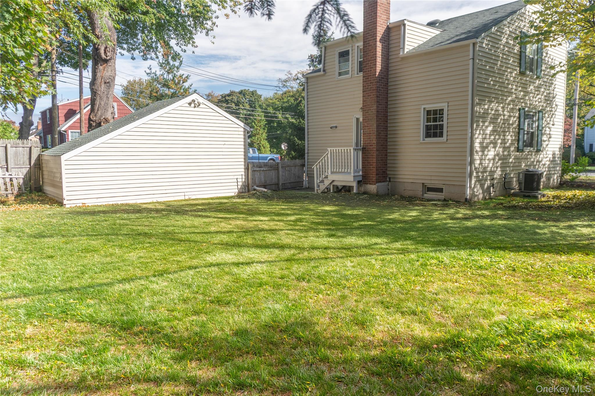 93 Beverly Road White Plains, NY 10605 - Photo 12 of 14 a view of a house with a yard