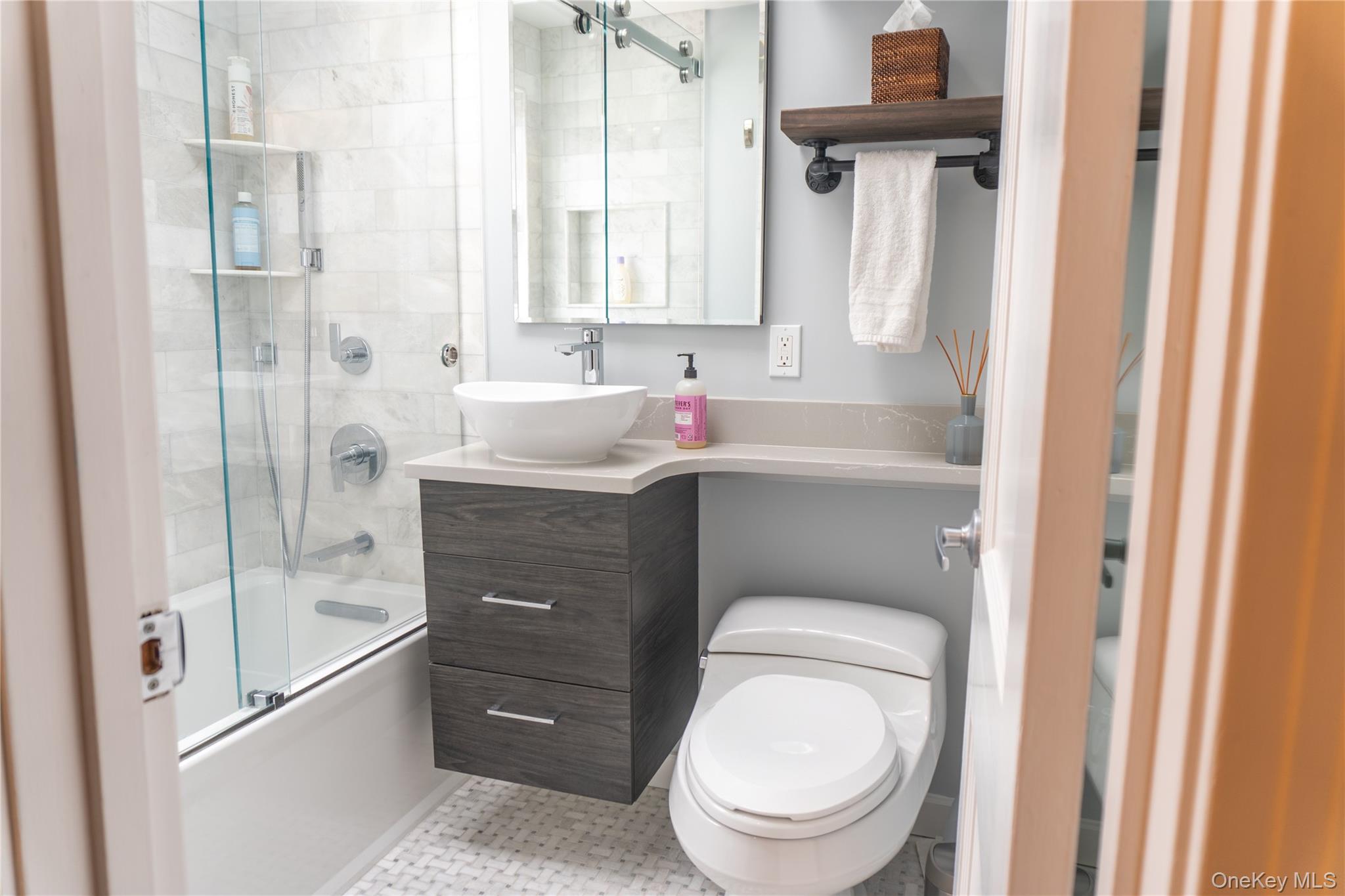 93 Beverly Road White Plains, NY 10605 - Photo 7 of 14 a bathroom with a sink a toilet and shower