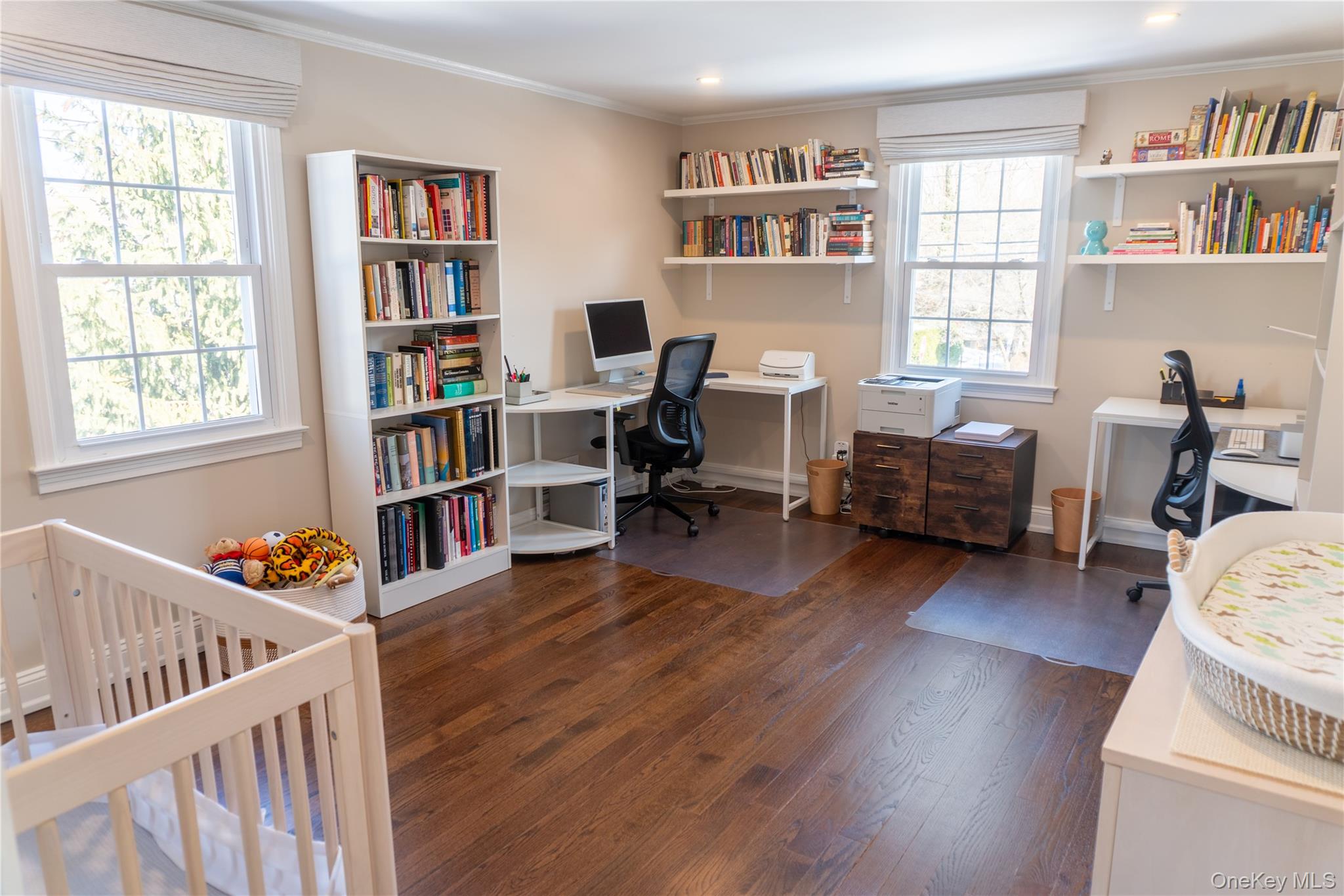 93 Beverly Road White Plains, NY 10605 - Photo 10 of 14 a living room with furniture and a book shelf