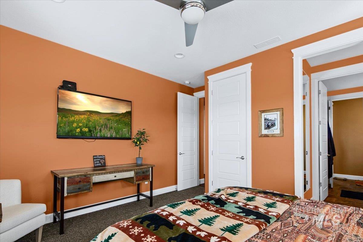 24053 Pheasant Ridge Court Middleton, ID 83644 - Photo 35 of 50 Bedroom with a ceiling fan, dark carpet, and recessed lighting