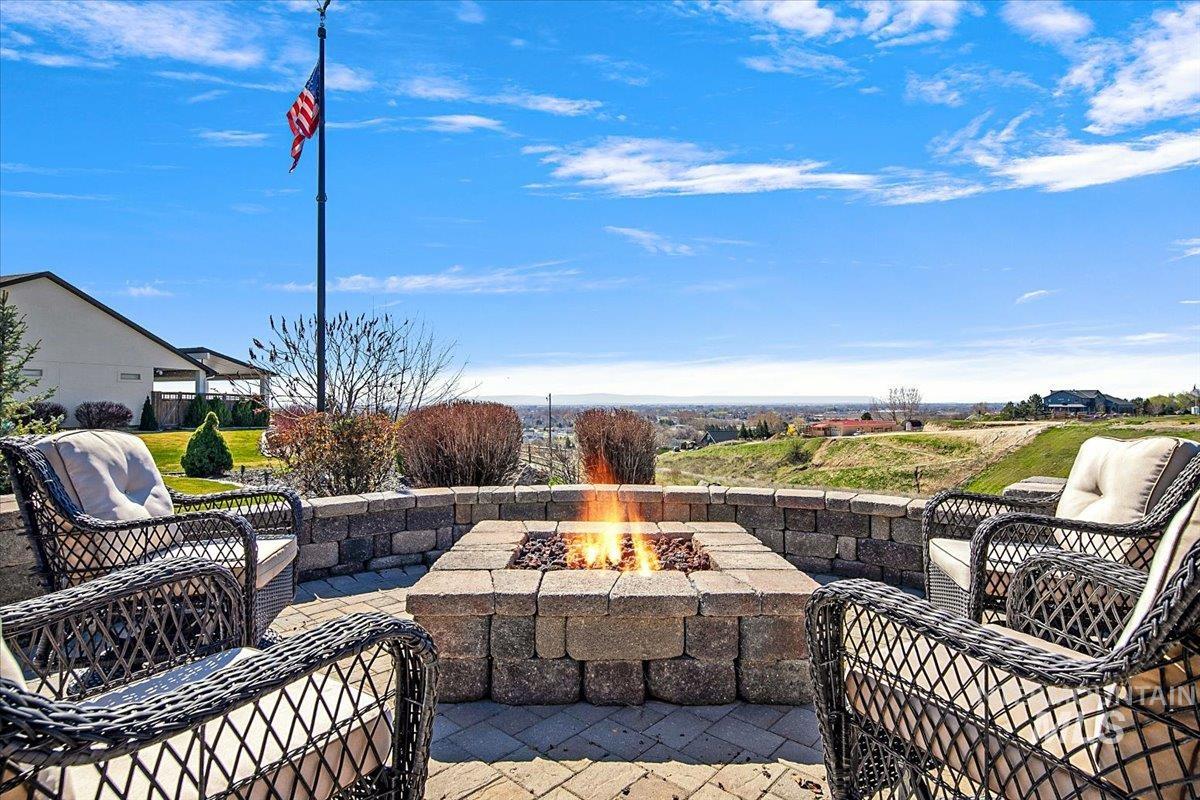 24053 Pheasant Ridge Court Middleton, ID 83644 - Photo 39 of 50 View of patio featuring an outdoor fire pit