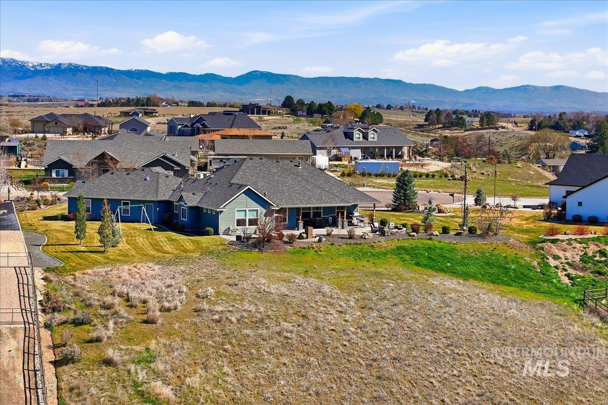 24053 Pheasant Ridge Court Middleton, ID 83644 - Photo 47 of 50 Aerial perspective of suburban area with mountains