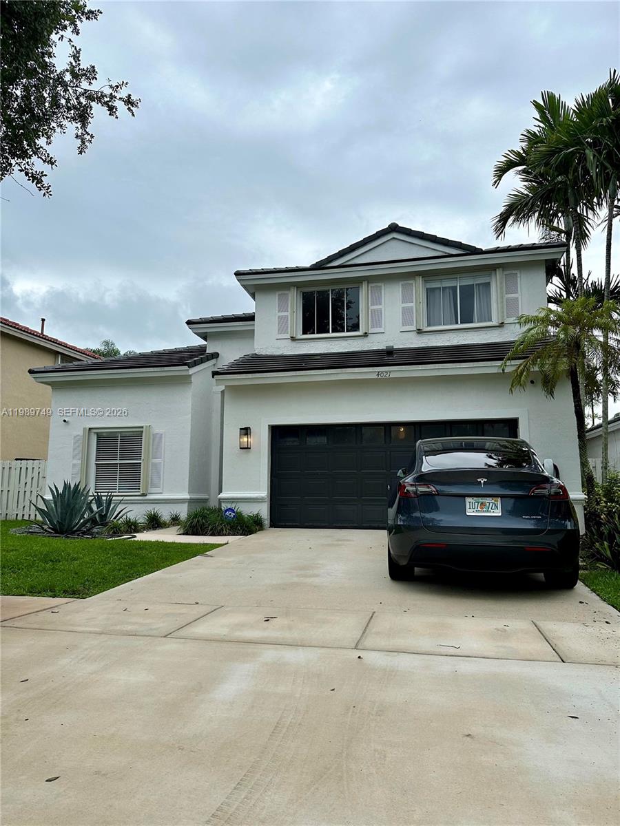 4021 Southwest 153rd Avenue Miramar, FL 33027 - Photo 1 of 42 a house view with a garden space