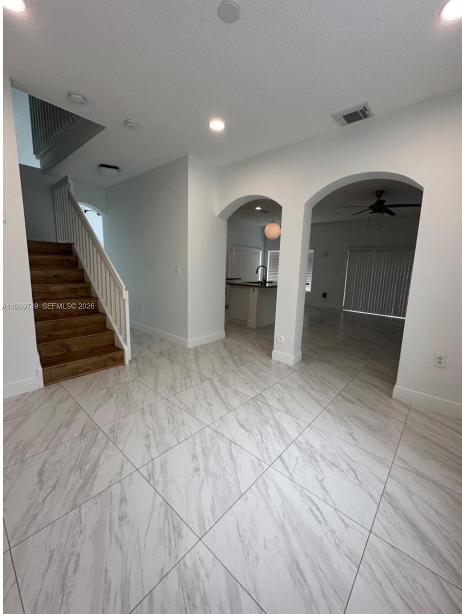 4021 Southwest 153rd Avenue Miramar, FL 33027 - Photo 11 of 42 a view of an empty room and stairs