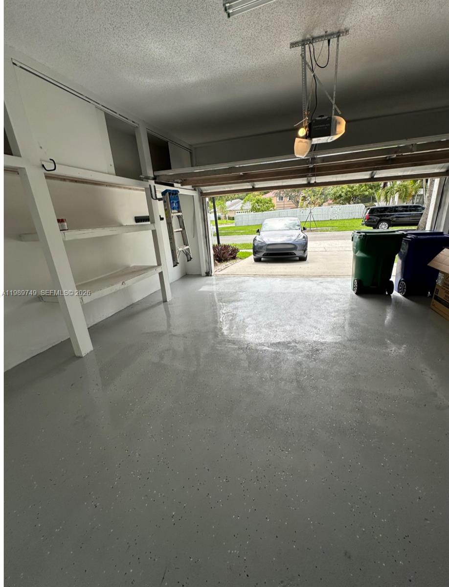 4021 Southwest 153rd Avenue Miramar, FL 33027 - Photo 12 of 42 a car with garage