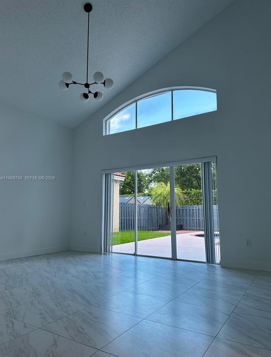 4021 Southwest 153rd Avenue Miramar, FL 33027 - Photo 13 of 42 a view of an empty room with a balcony