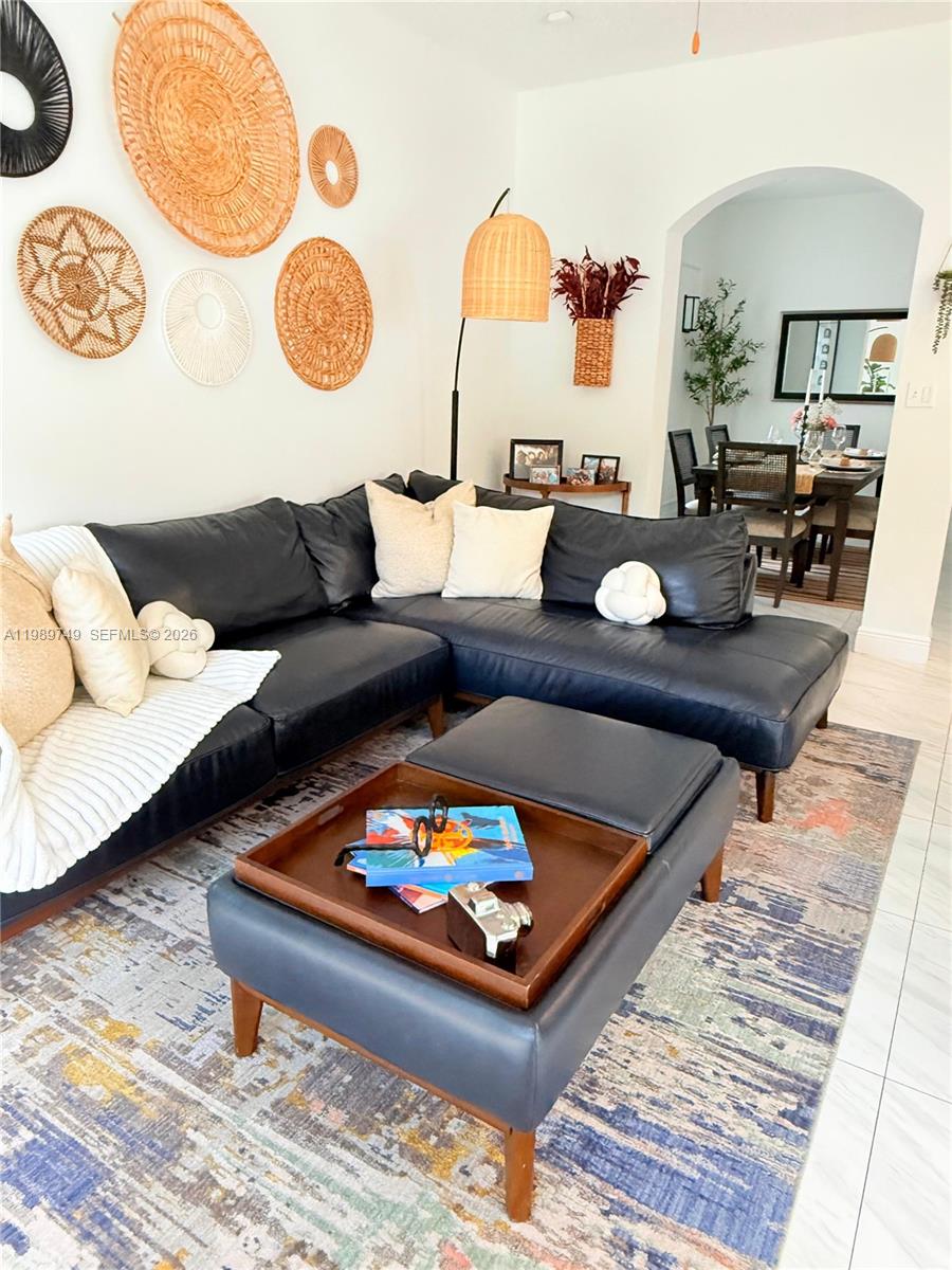 4021 Southwest 153rd Avenue Miramar, FL 33027 - Photo 24 of 42 a living room with furniture and a rug