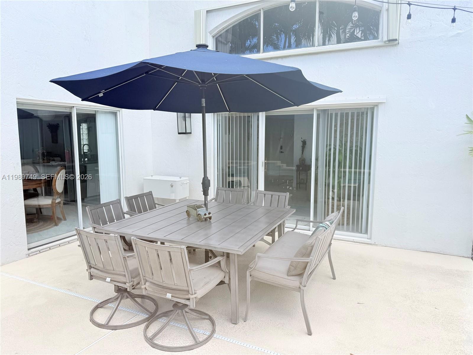 4021 Southwest 153rd Avenue Miramar, FL 33027 - Photo 39 of 42 a dining room with furniture and wooden floor