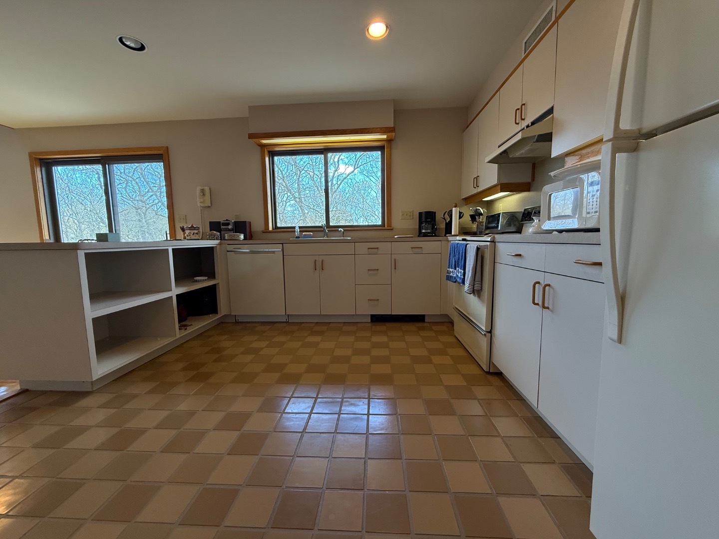 82 Oyster Pond Road Edgartown, MA 02539 - Photo 31 of 53 a kitchen with a cabinets and appliances