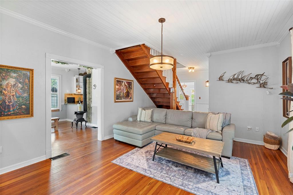 6501 Matchett Road Belle Isle, FL 32809 - Photo 12 of 43 a living room with furniture and wooden floor
