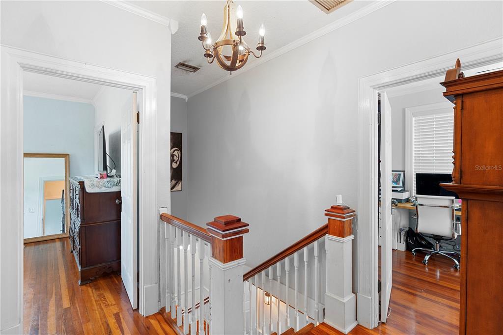 6501 Matchett Road Belle Isle, FL 32809 - Photo 19 of 43 a view of a hallway with workspace and entryway