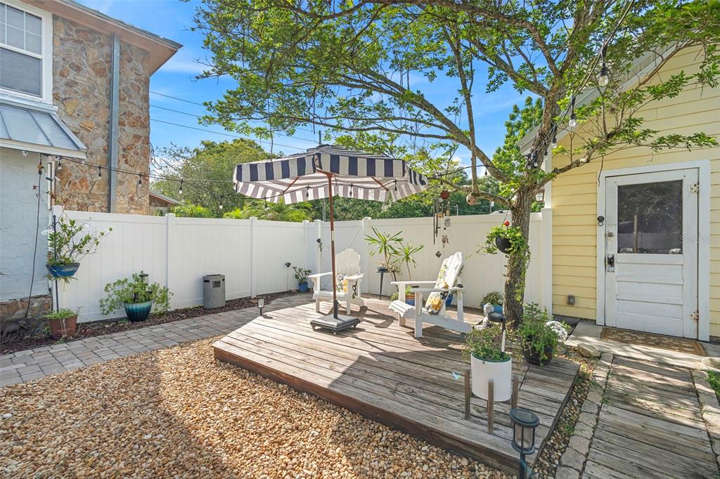 6501 Matchett Road Belle Isle, FL 32809 - Photo 28 of 43 a view of a patio with table and chairs and potted plants