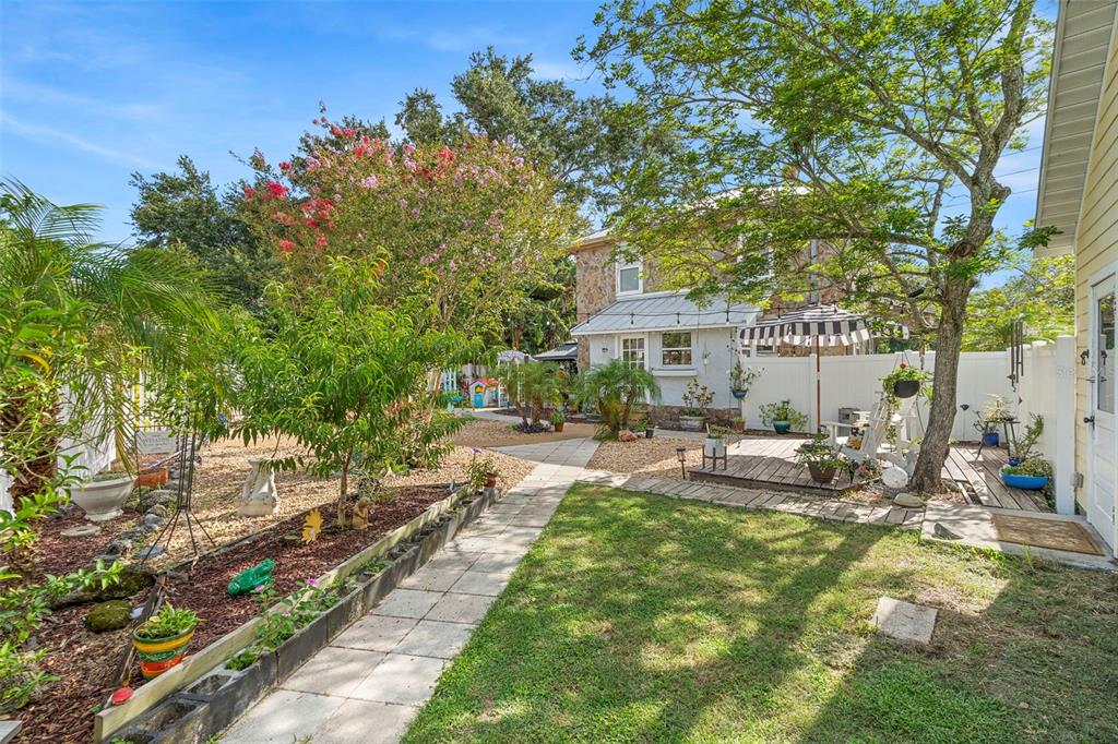 6501 Matchett Road Belle Isle, FL 32809 - Photo 30 of 43 a view of a backyard with sitting area