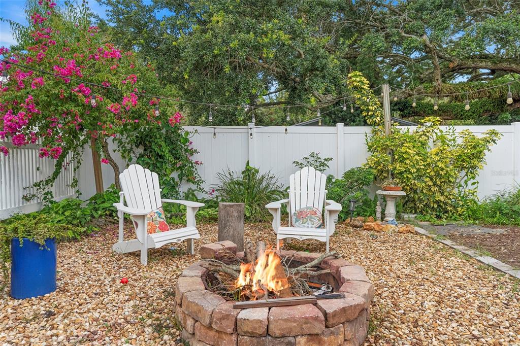 6501 Matchett Road Belle Isle, FL 32809 - Photo 33 of 43 a view of a backyard with plants and a patio