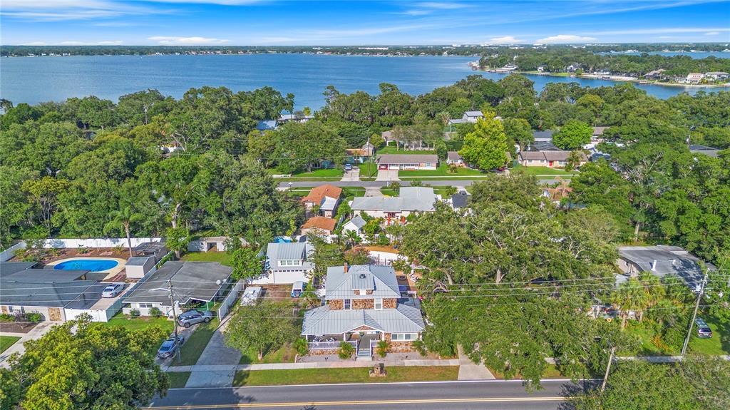 6501 Matchett Road Belle Isle, FL 32809 - Photo 37 of 43 an aerial view of a city with lots of residential buildings ocean and mountain view in back