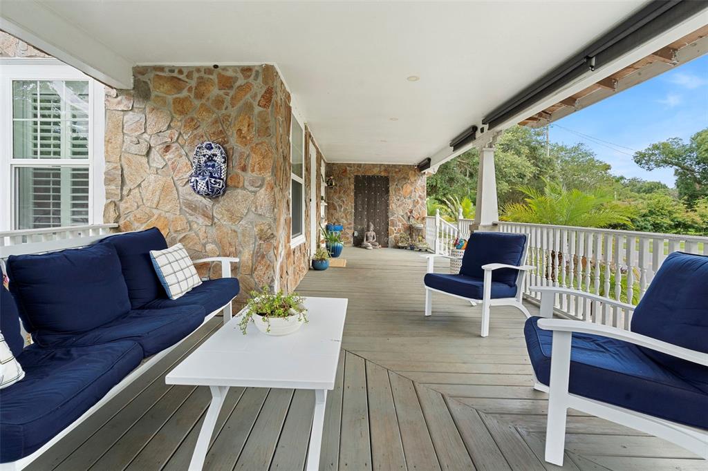 6501 Matchett Road Belle Isle, FL 32809 - Photo 4 of 43 a living room with furniture and a large window